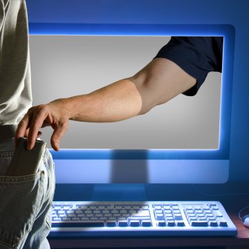 hand from monitor stealing man wallet identity theft